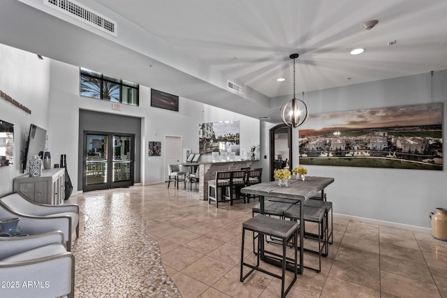 dining area featuring recessed lighting, tile patterned flooring, visible vents, and baseboards