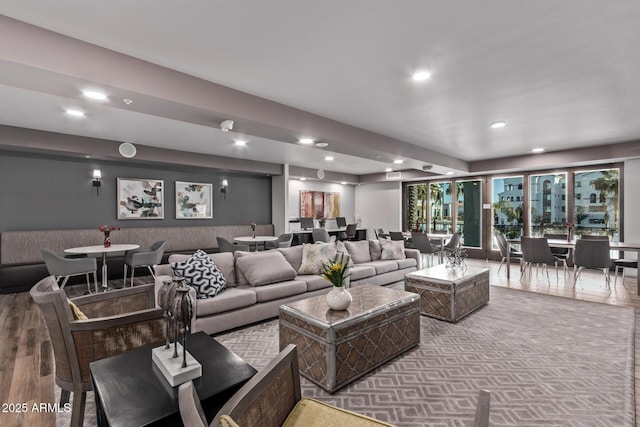 living room featuring wood finished floors and recessed lighting