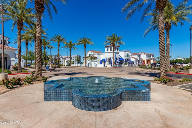 view of pool featuring a residential view