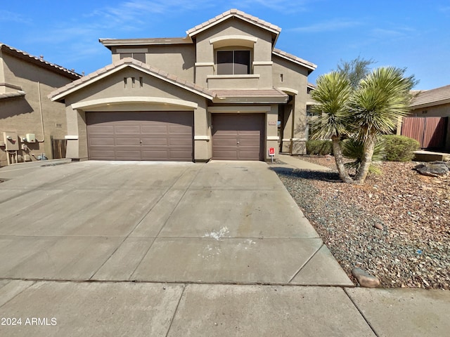 view of front of property featuring a garage