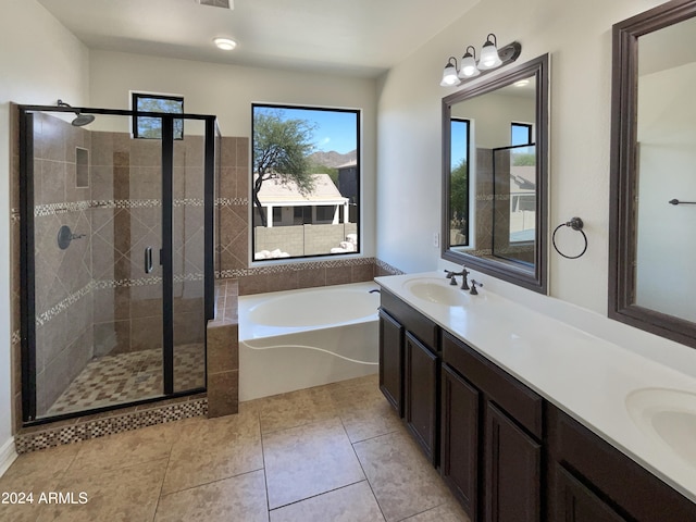 bathroom with vanity, separate shower and tub, and tile patterned floors