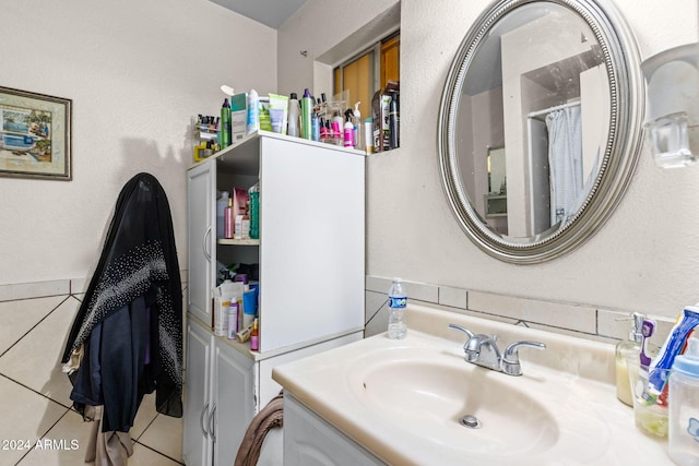 bathroom featuring vanity and tile patterned flooring