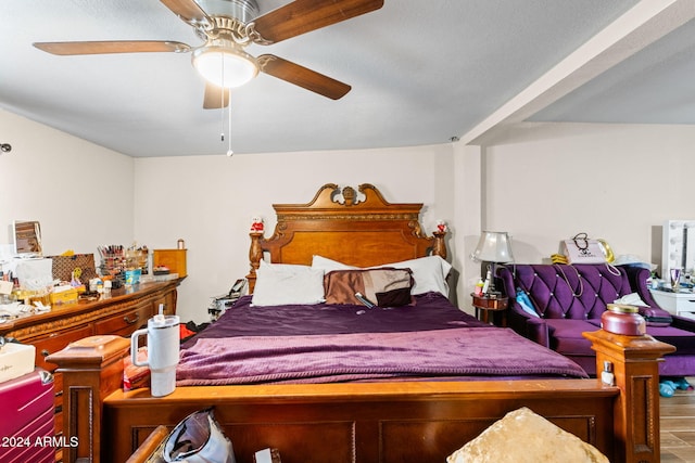 bedroom featuring hardwood / wood-style flooring and ceiling fan