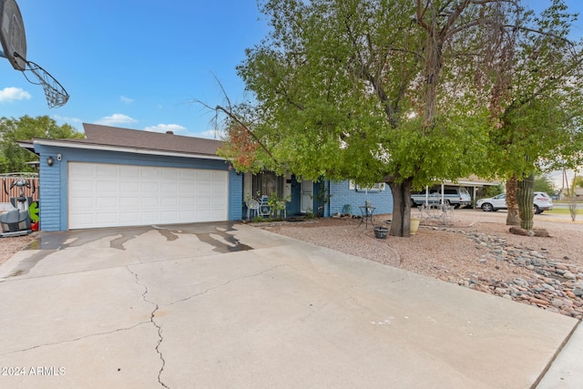 view of front of property with a garage