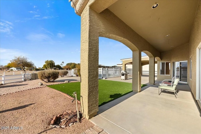 view of patio / terrace featuring a grill