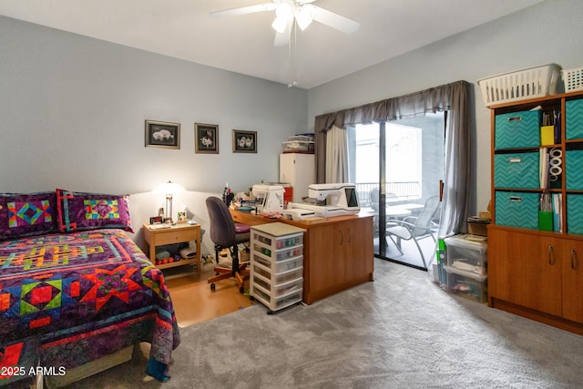 carpeted bedroom featuring a ceiling fan and access to exterior