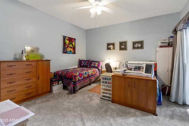 bedroom with light carpet and a ceiling fan