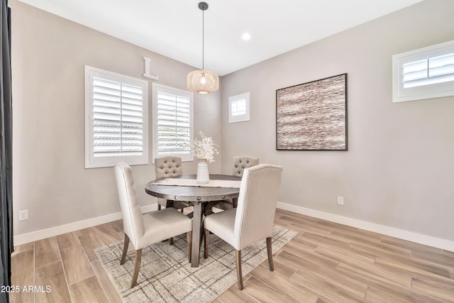 dining room featuring light wood-type flooring