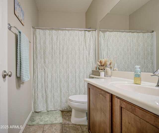 full bathroom with toilet, vanity, tile patterned floors, and curtained shower