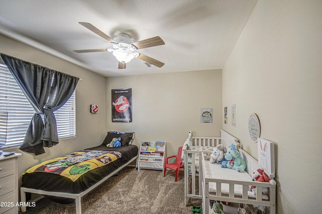 bedroom featuring carpet flooring and a ceiling fan
