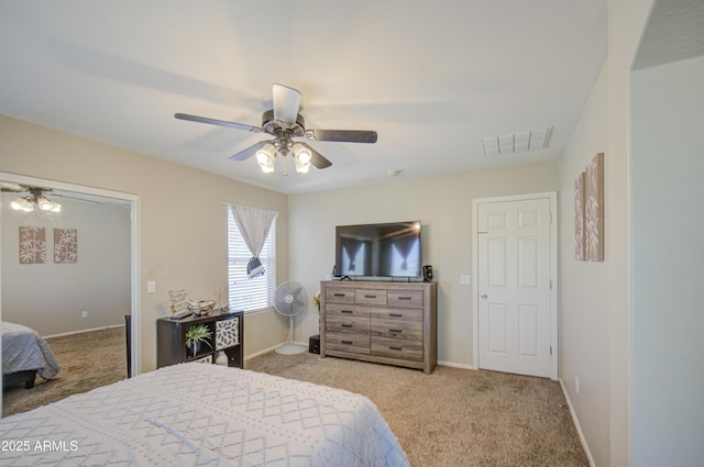 bedroom with carpet floors, baseboards, and ceiling fan