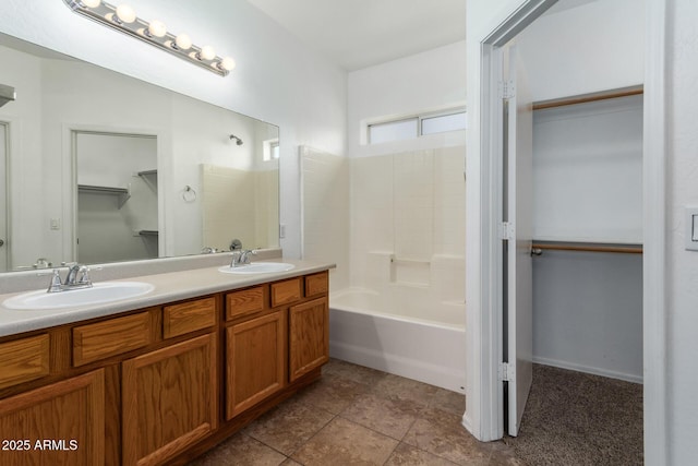 bathroom with vanity and tile patterned flooring