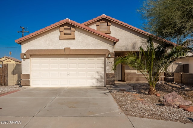 view of front of home with a garage