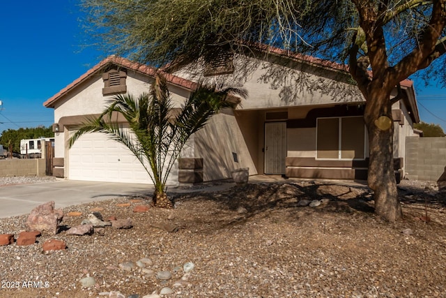 view of front of property with a garage