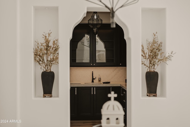 bathroom featuring tasteful backsplash and vanity