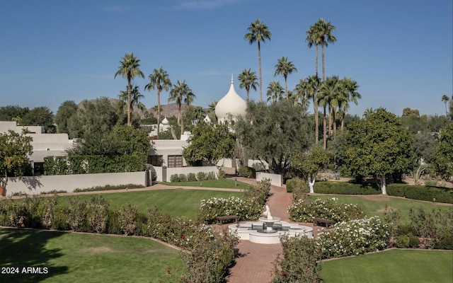 surrounding community featuring a lawn