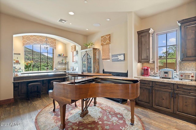 miscellaneous room with light hardwood / wood-style floors