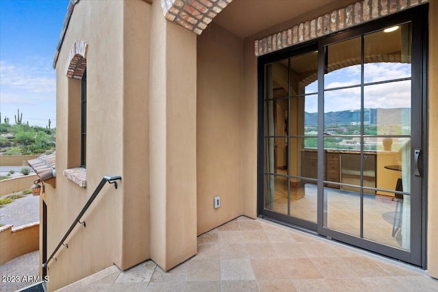 doorway to property with a mountain view