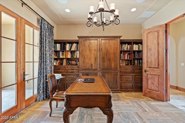 office area with french doors, light parquet floors, an inviting chandelier, and a wealth of natural light