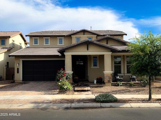 3871 E Harrison St, Gilbert, AZ 85295 - craftsman-style house featuring a porch, a garage, stucco siding, and decorative driveway