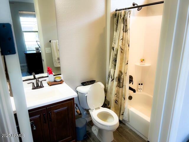 3871 E Harrison St, Gilbert, AZ 85295 - bathroom featuring shower / bath combo with shower curtain, toilet, and vanity