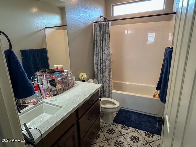 3871 E Harrison St, Gilbert, AZ 85295 - bathroom featuring shower / tub combo with curtain, toilet, and vanity