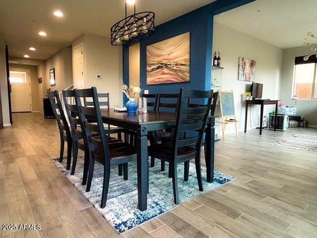 3871 E Harrison St, Gilbert, AZ 85295 - dining space featuring wood finished floors, recessed lighting, and a chandelier
