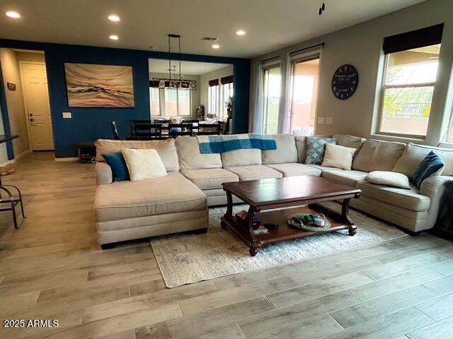 3871 E Harrison St, Gilbert, AZ 85295 - living room with a wealth of natural light, visible vents, recessed lighting, and light wood finished floors