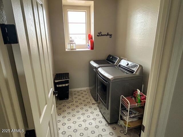 3871 E Harrison St, Gilbert, AZ 85295 - laundry room featuring washer and dryer, laundry area, and light floors