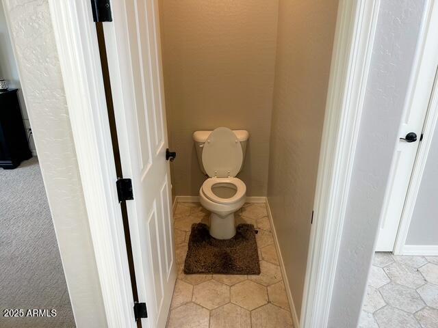 3871 E Harrison St, Gilbert, AZ 85295 - bathroom with toilet, tile patterned flooring, and baseboards