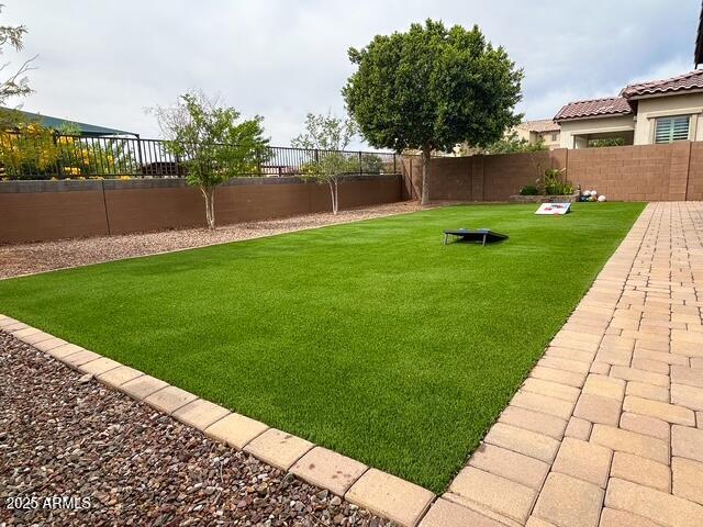 3871 E Harrison St, Gilbert, AZ 85295 - view of yard featuring a fenced backyard
