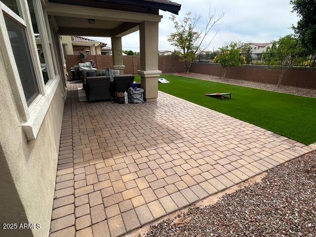 3871 E Harrison St, Gilbert, AZ 85295 - view of patio featuring outdoor dining space and a fenced backyard