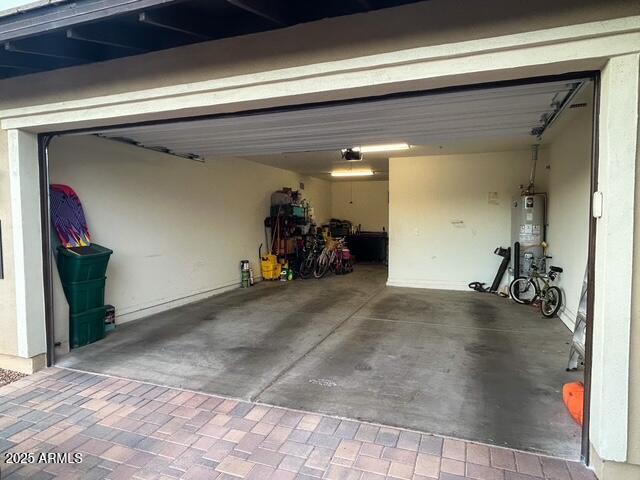 3871 E Harrison St, Gilbert, AZ 85295 - garage with water heater and a garage door opener