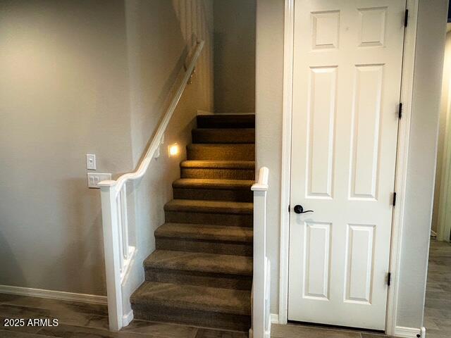 3871 E Harrison St, Gilbert, AZ 85295 - stairs featuring wood finished floors and baseboards