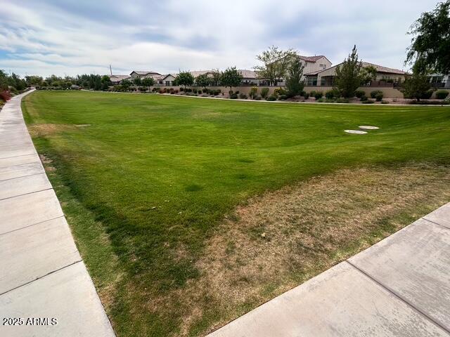 3871 E Harrison St, Gilbert, AZ 85295 - view of community with a yard and a residential view