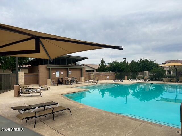 3871 E Harrison St, Gilbert, AZ 85295 - community pool with a patio and fence