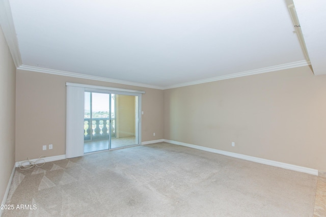 7970 E Camelback Rd Unit 604, Scottsdale, AZ 85251 - empty room featuring ornamental molding, light carpet, and baseboards