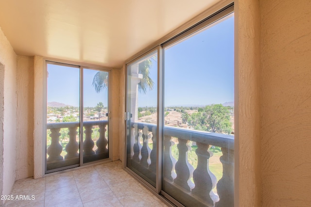7970 E Camelback Rd Unit 604, Scottsdale, AZ 85251 - unfurnished sunroom with tile patterned floors