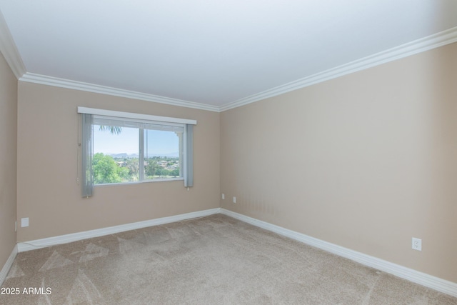 7970 E Camelback Rd Unit 604, Scottsdale, AZ 85251 - spare room with crown molding, light colored carpet, and baseboards