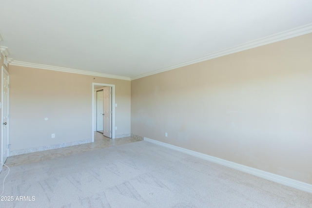 7970 E Camelback Rd Unit 604, Scottsdale, AZ 85251 - spare room with light carpet, crown molding, and baseboards
