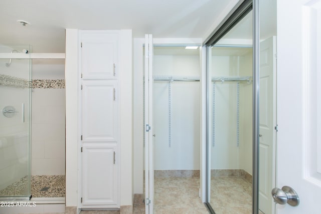 7970 E Camelback Rd Unit 604, Scottsdale, AZ 85251 - bathroom with a stall shower