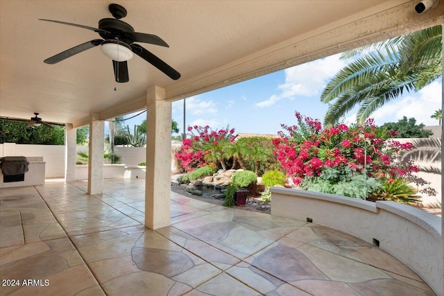 view of patio featuring ceiling fan