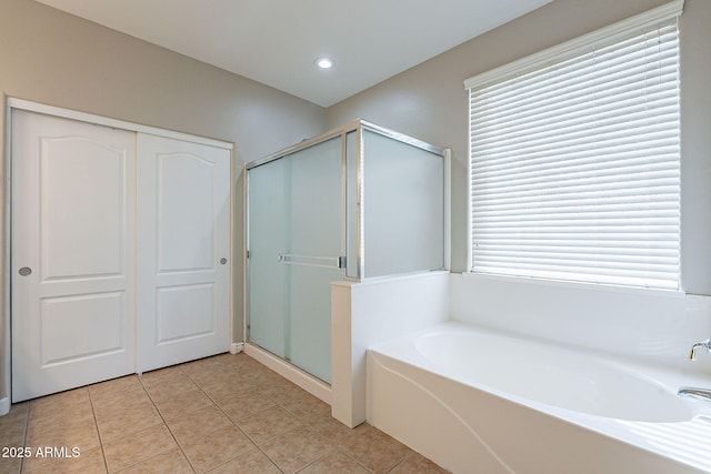 full bathroom with tile patterned floors, recessed lighting, a shower stall, and a bath