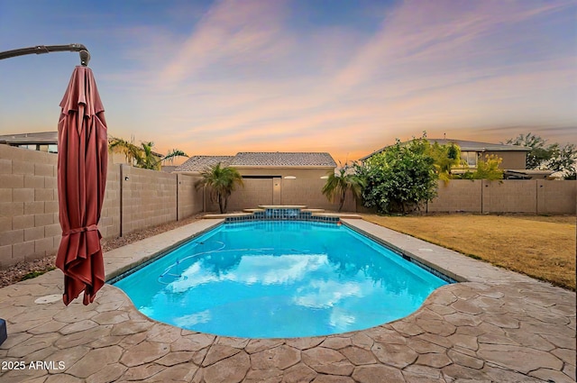 view of pool featuring a fenced in pool, a lawn, and a fenced backyard