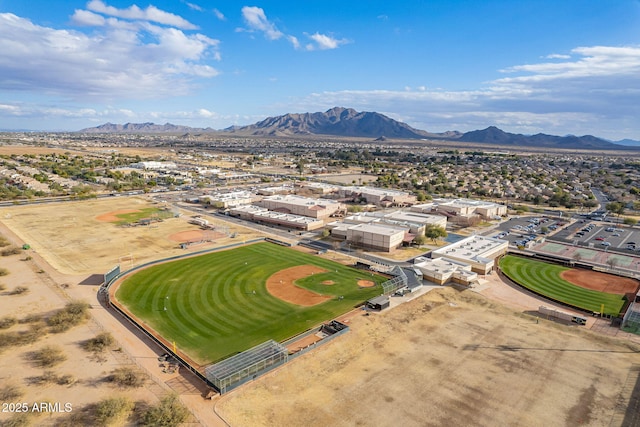 birds eye view of property with a mountain view