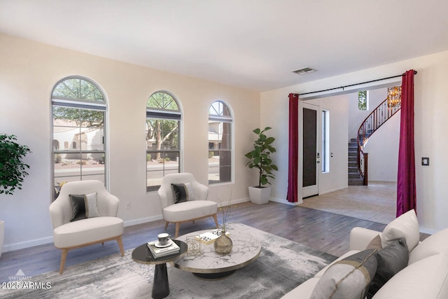 living room with light hardwood / wood-style flooring