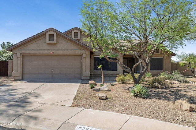 28814 N 45th St, Cave Creek, AZ 85331 - view of front of property featuring driveway, an attached garage, and stucco siding