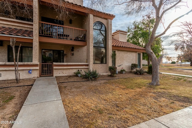 exterior space with a balcony