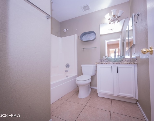 full bathroom featuring tile patterned floors, vanity, toilet, and tub / shower combination