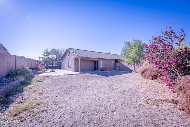 back of house featuring a patio area